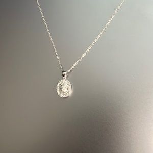 1/5 ct total weight diamond pendant necklace in an 18” White Gold 14k chain.